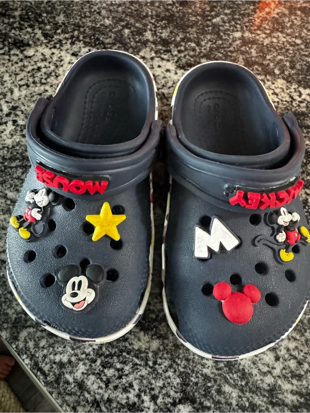 CROCS Kids Navy Clogs with Red, Yellow & White Charms